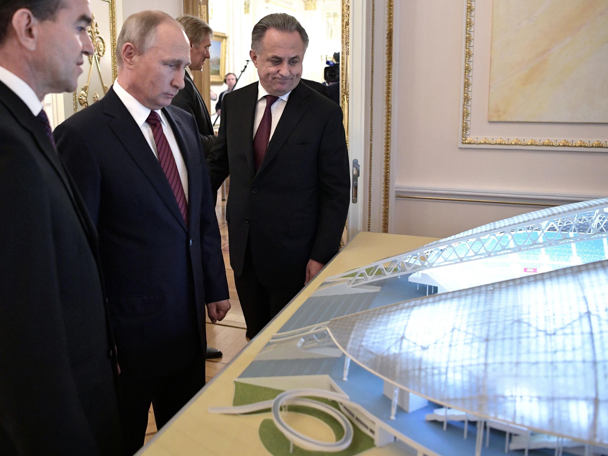 Vladimir Putin attends an exhibition on preparations for the 2018 World Cup at the Kremlin on Tuesday