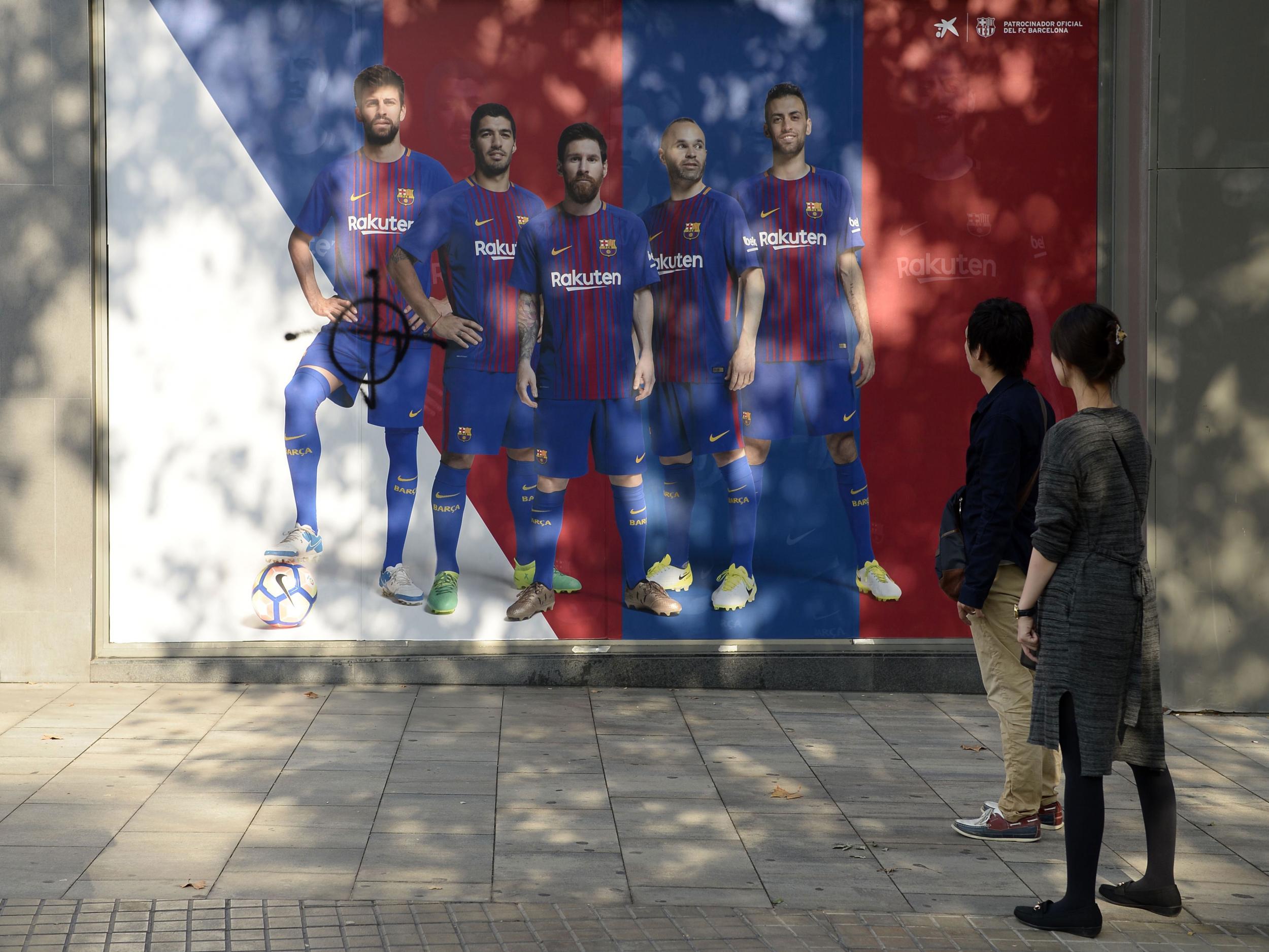 An image of Gerard Pique, vandalised after the weekend's protests