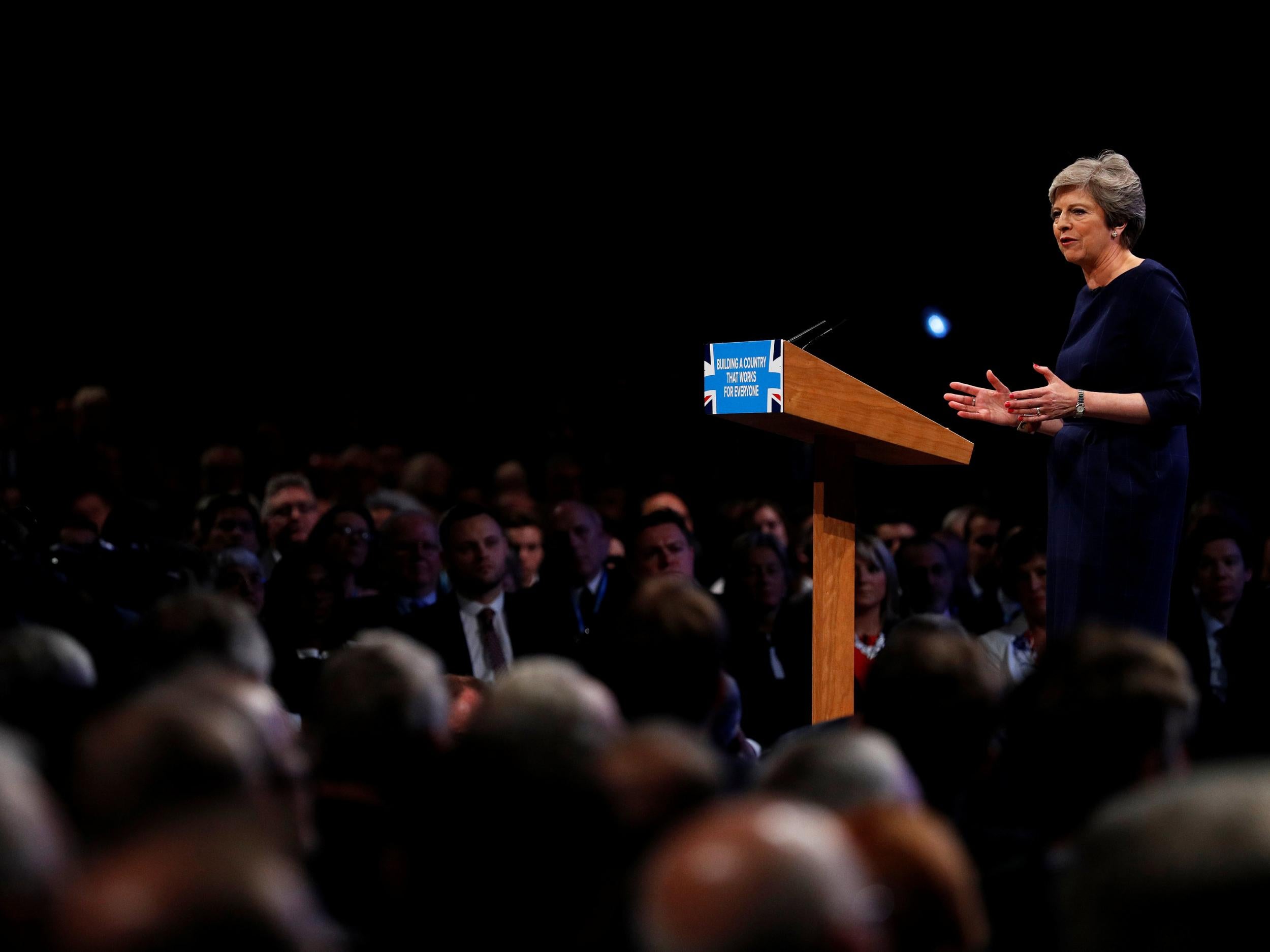 Conservative leader and Prime Minister Theresa May speaking at the Conservative Party conference to an audience of all ages