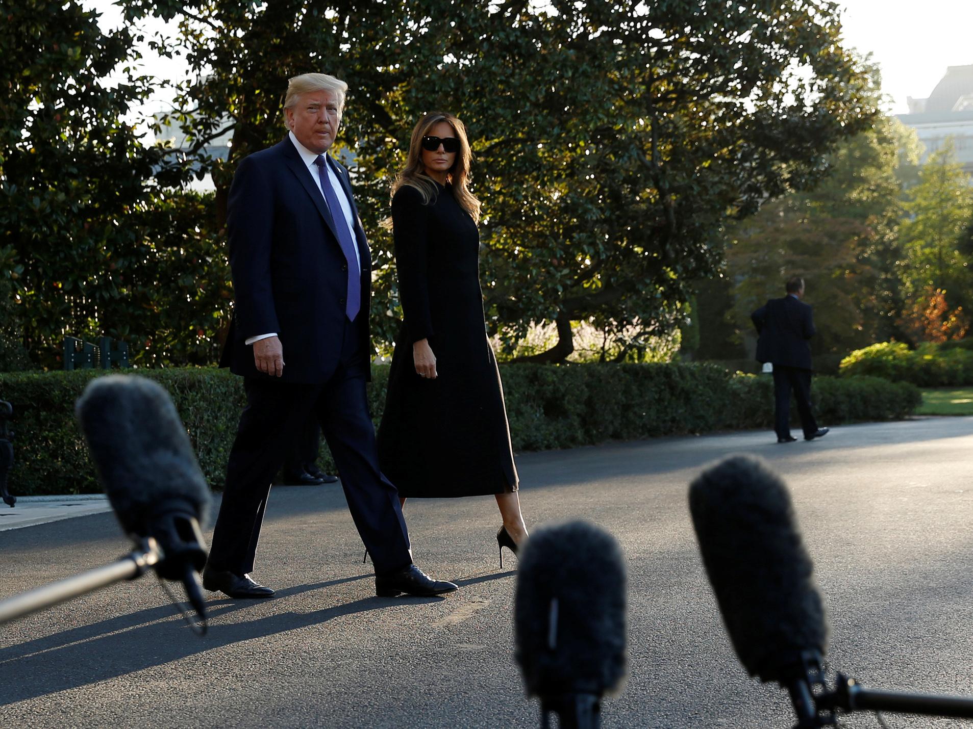 US President Donald Trump and First Lady Melania Trump depart for travel to Las Vegas, in the aftermath of the shooting there, from the South Lawn of the White House in Washington