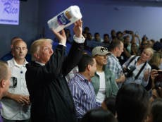 Puerto Ricans accuse Trump of treating them 'like dogs' during visit