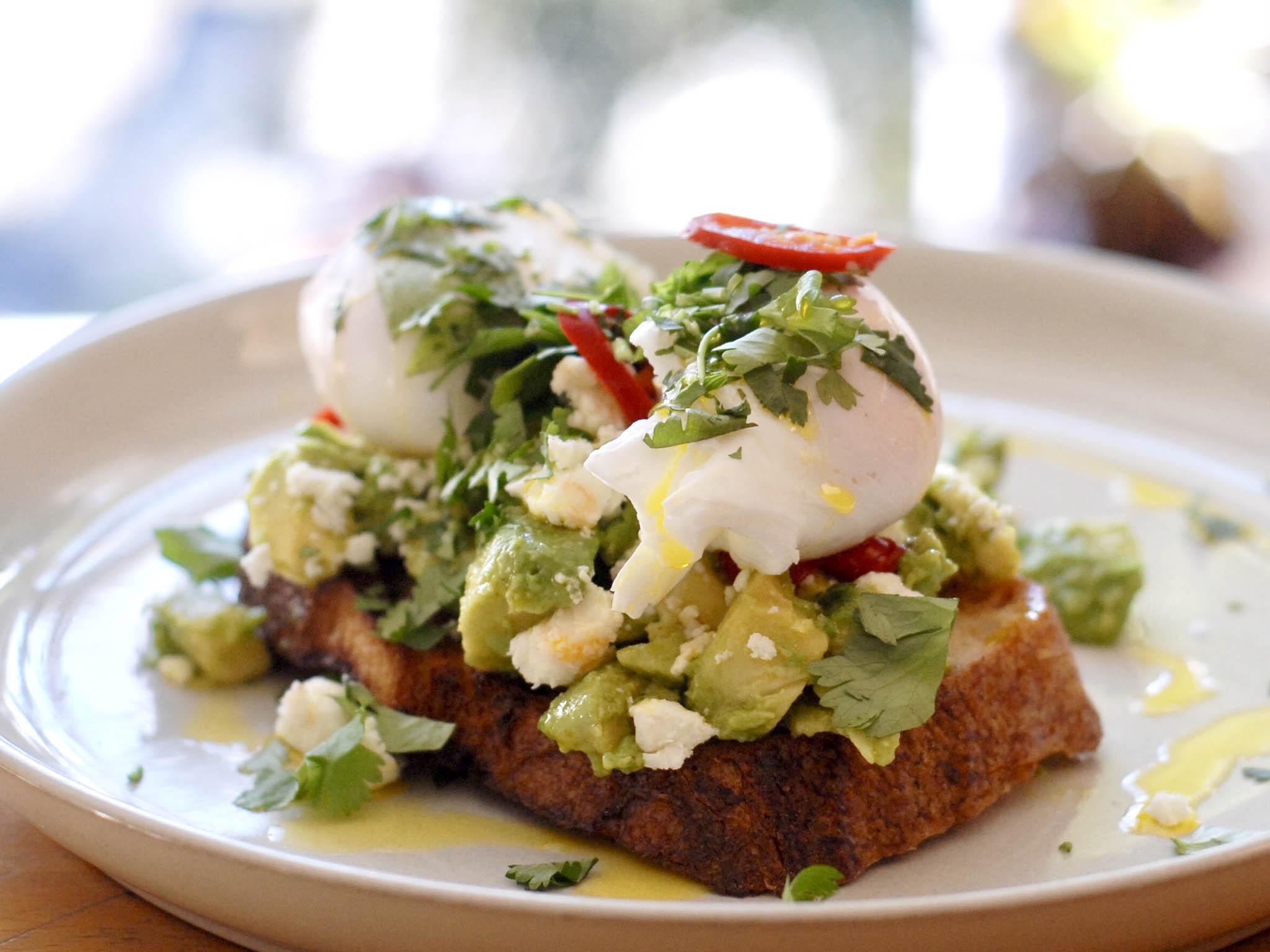 Flat White Kitchen’s house breakfast of avocado on toast, chilli, feta and coriander
