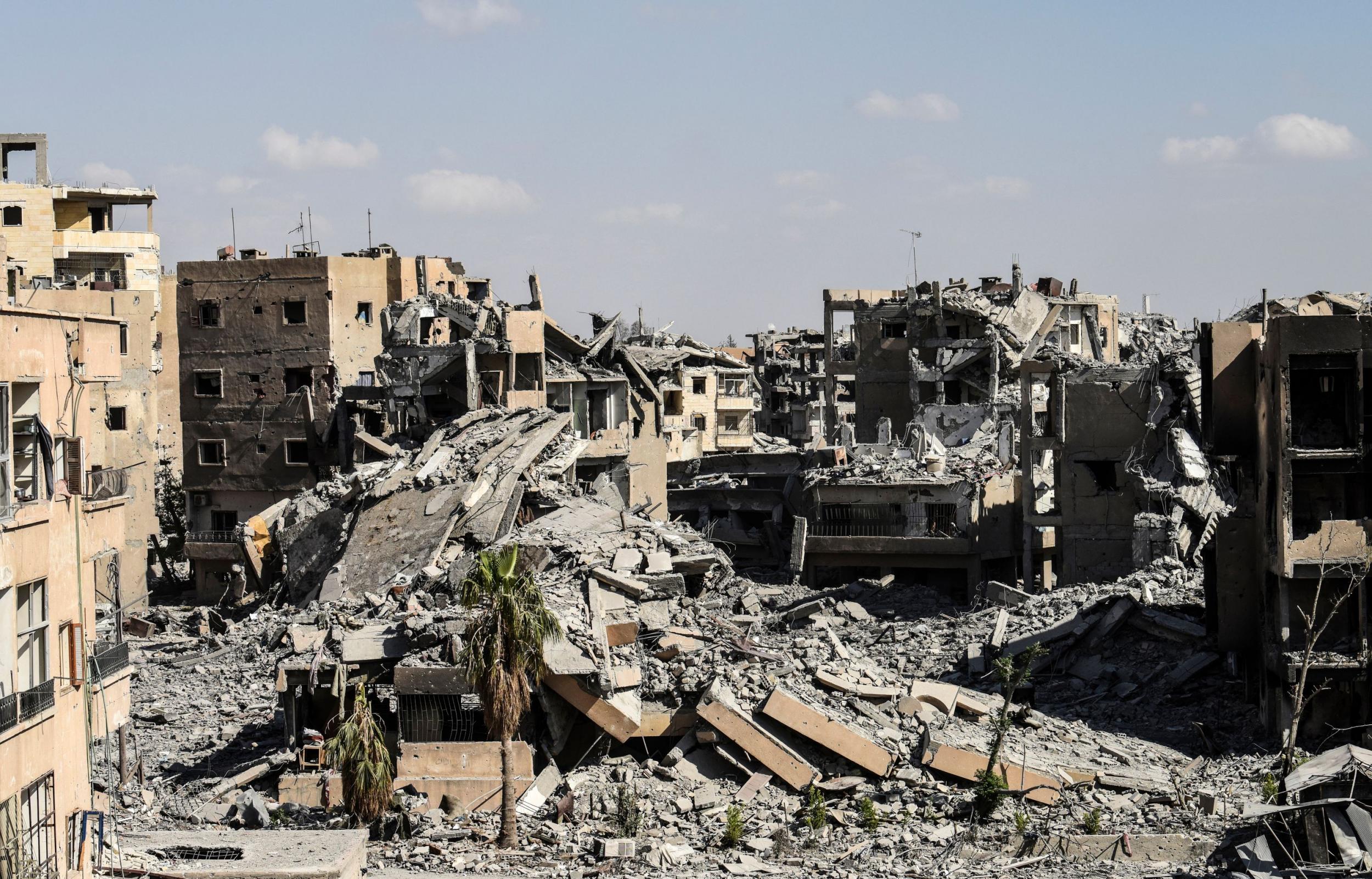 Destruction near Raqqa's central hospital, one of the last Isis-controlled buildings in the city, photographed on 1 October 2017