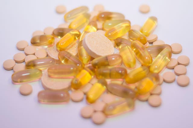 Vitamin C tablets and Omega 3 fish oil liquid capsules