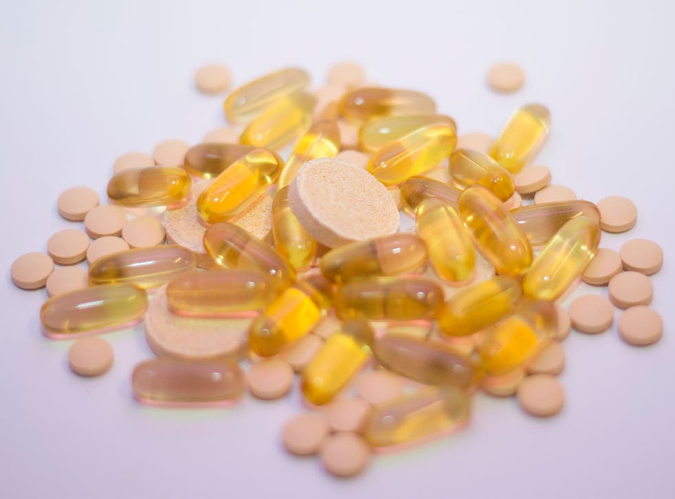 Vitamin C tablets and Omega 3 fish oil liquid capsules