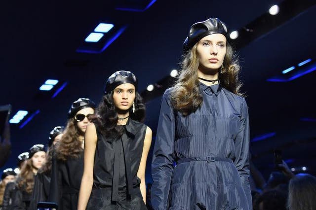  Models sport berets during the Christian Dior show as part of Paris Fashion Week
