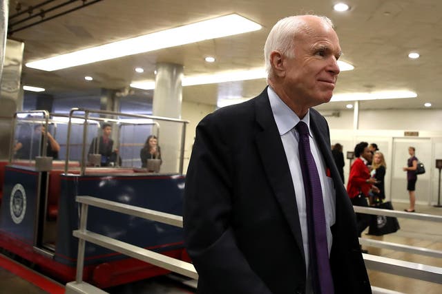 US Senator John McCain walks to the US Capitol