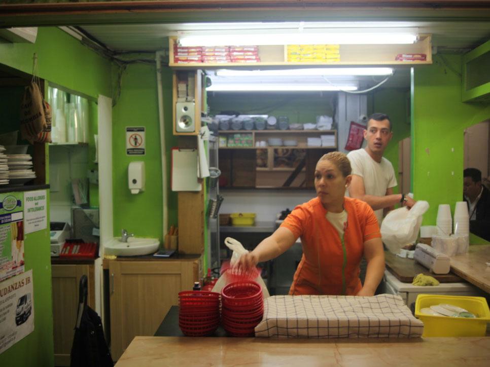 Staff prepare food at Esquina de Blanca