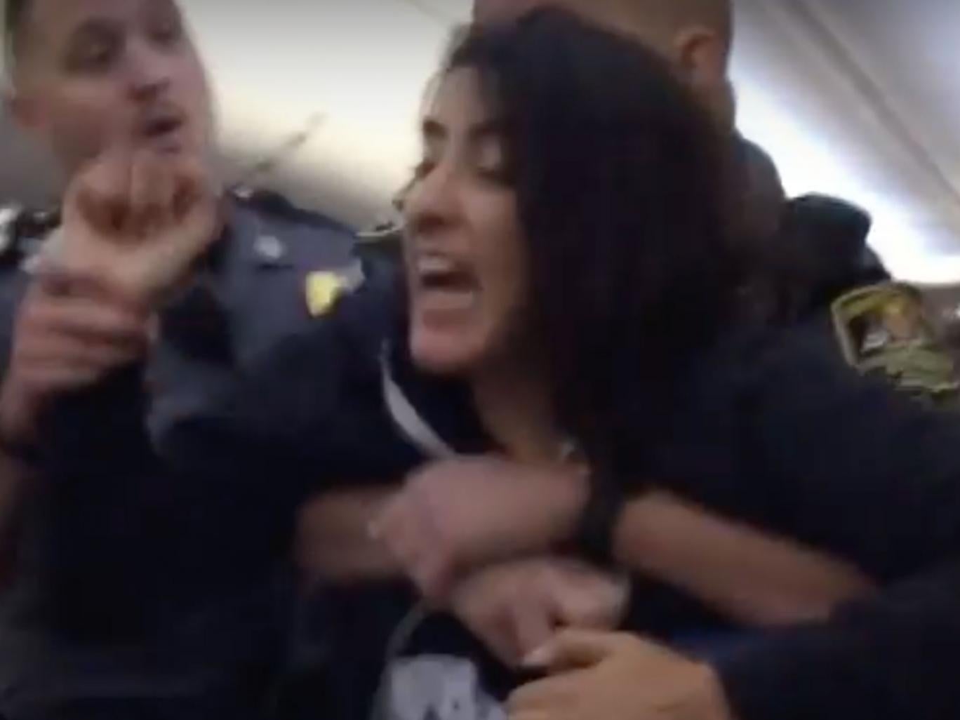 Anila Daulatzai was filmed being dragged from a flight to Los Angeles