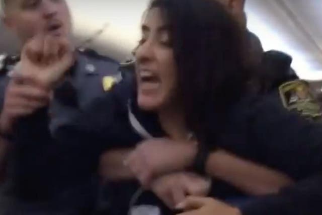 Anila Daulatzai was filmed being dragged from a flight to Los Angeles