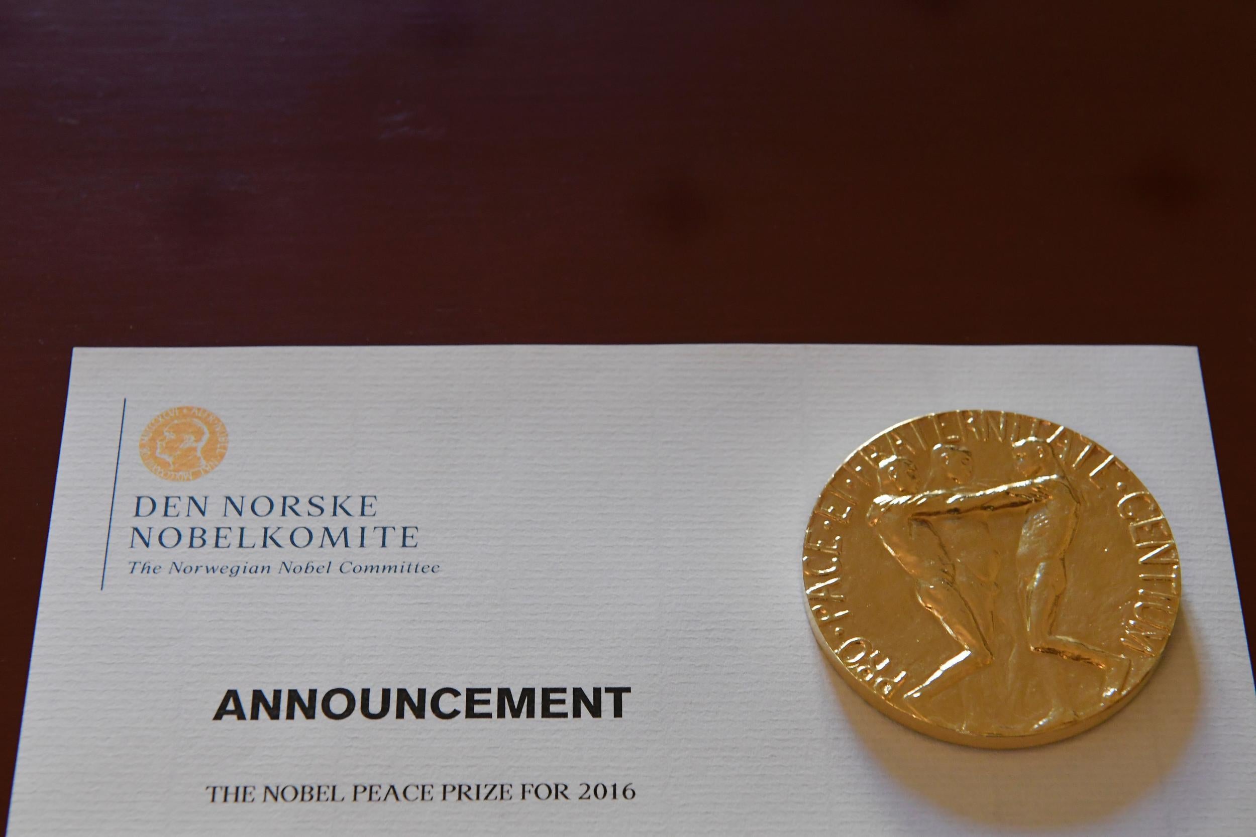 An information paper is seen at the Nobel Institute before a news conference of the 2016 Nobel Peace prize laureate in Oslo