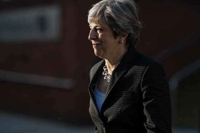 Theresa May is seen on the third day of the Conservative Party annual conference