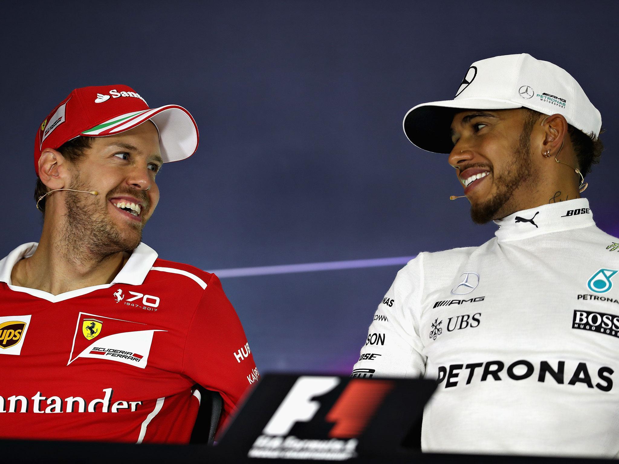 Jenson Button is enjoying the Sebastian Vettel vs Lewis Hamilton title battle