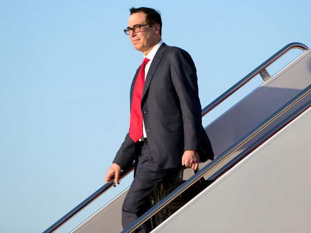Treasury Secretary Steven Mnuchin descending from Air Force One last month. One of his round-trip flights from Washington to New York cost $15,000