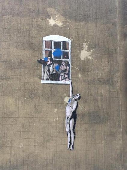 Banksy’s ‘Well Hung Lover’ was the UK’s first legal piece of graffiti