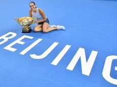Garcia beats Halep in Beijing to dent Konta's WTA Finals dream