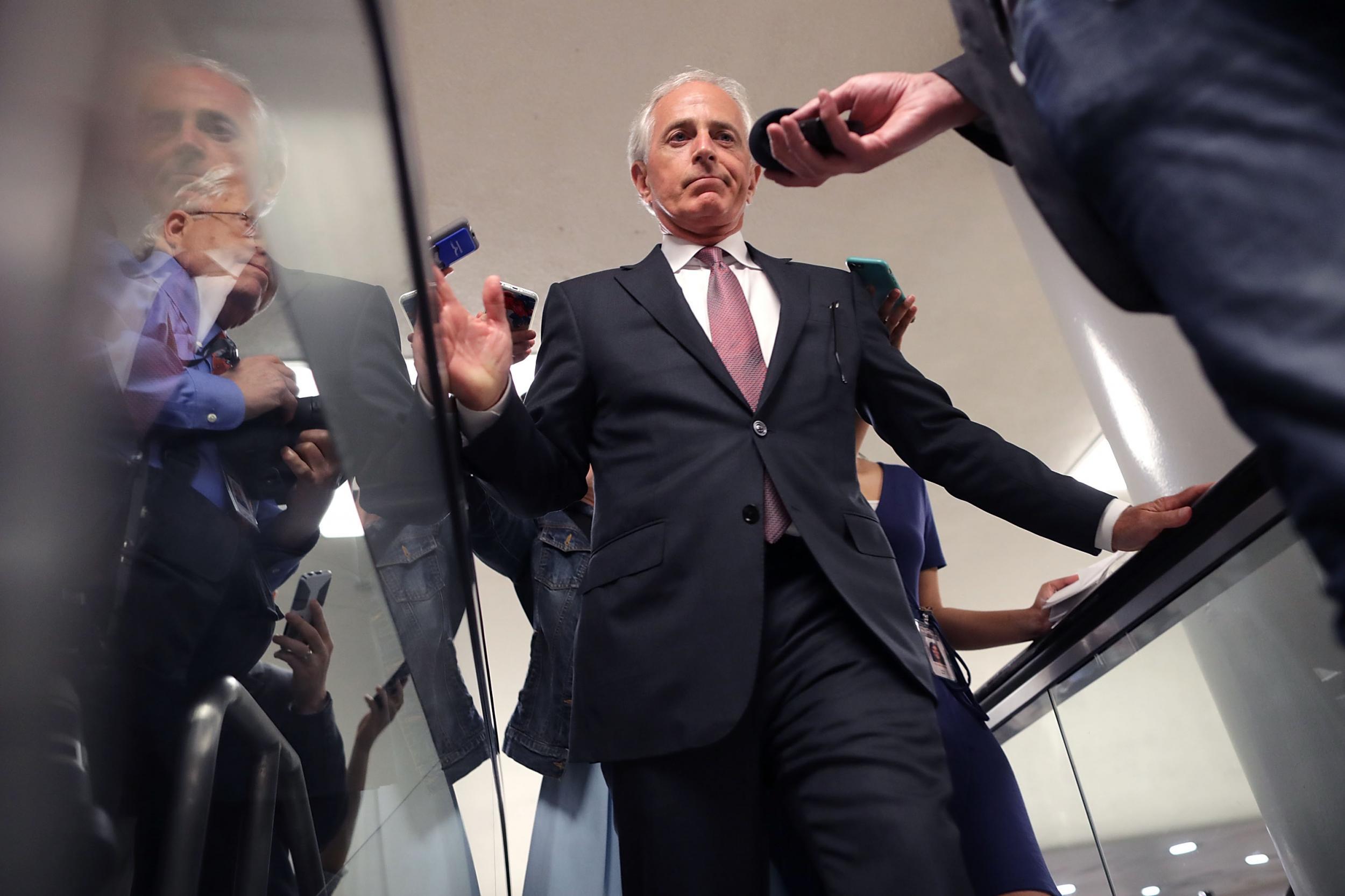 Senate Foreign Relations Committee Chairman Bob Corker talks with reporters