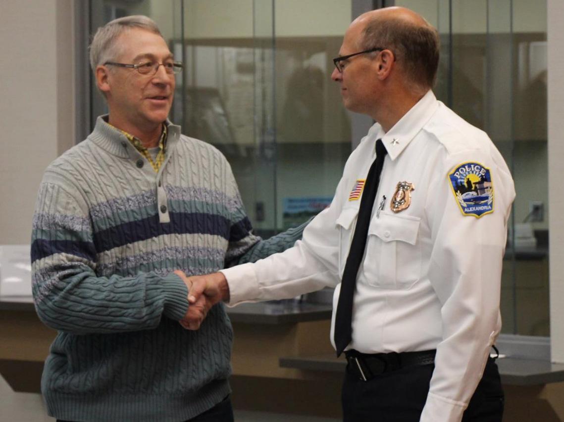 Earl Melchert, left, who helped rescue the 15-year-old kidnapping victim Jasmine Block, with Police Chief Richard Wyffels of Alexandria, Minnesota