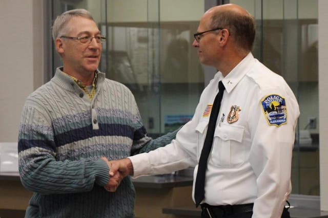 Earl Melchert, left, who helped rescue the 15-year-old kidnapping victim Jasmine Block, with Police Chief Richard Wyffels of Alexandria, Minnesota