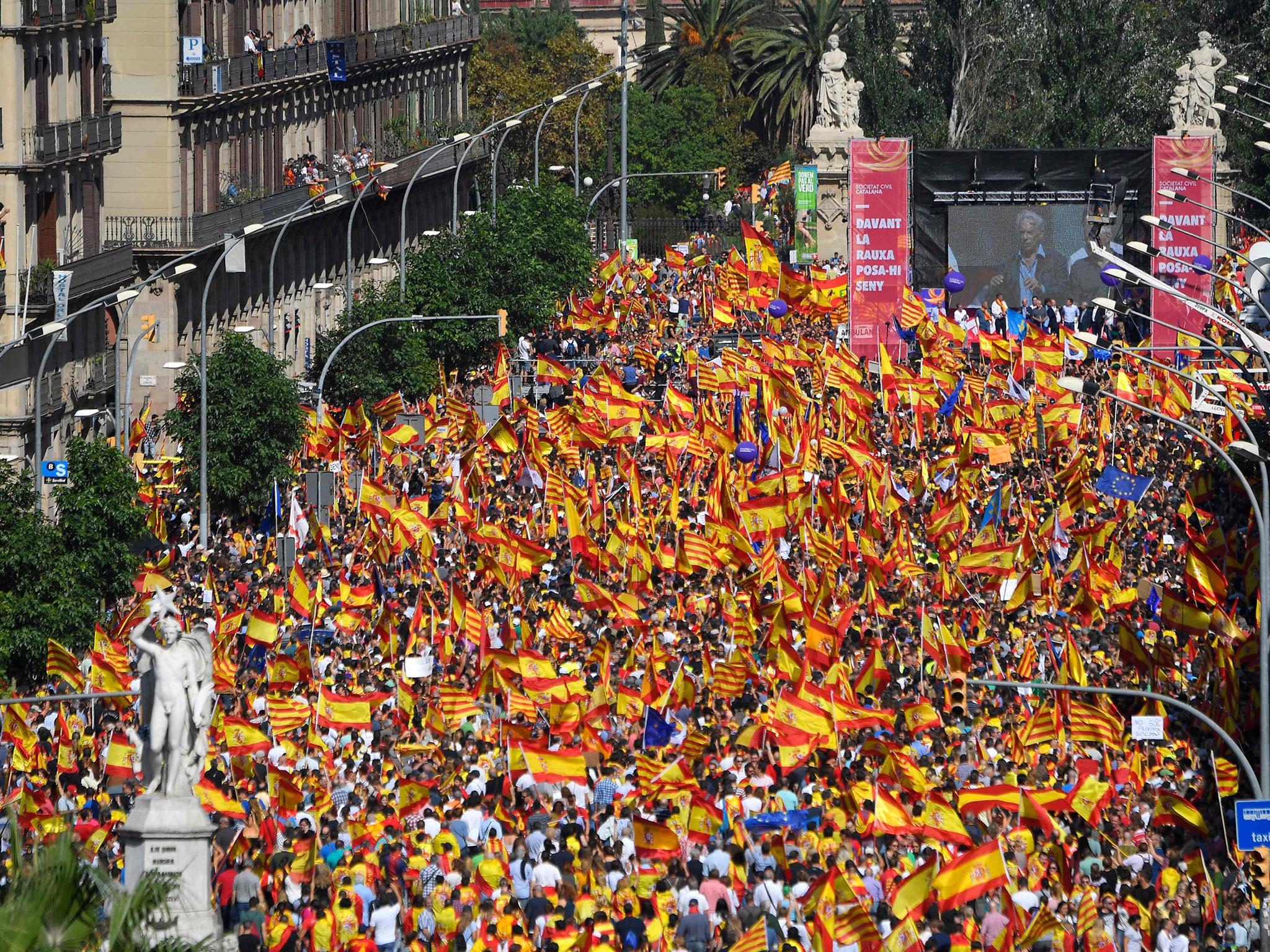 Protesters take part in a demonstration to support the unity of Spain on Sunday in Barcelona
