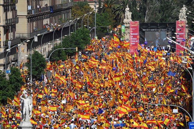 Protesters take part in a demonstration to support the unity of Spain on Sunday in Barcelona