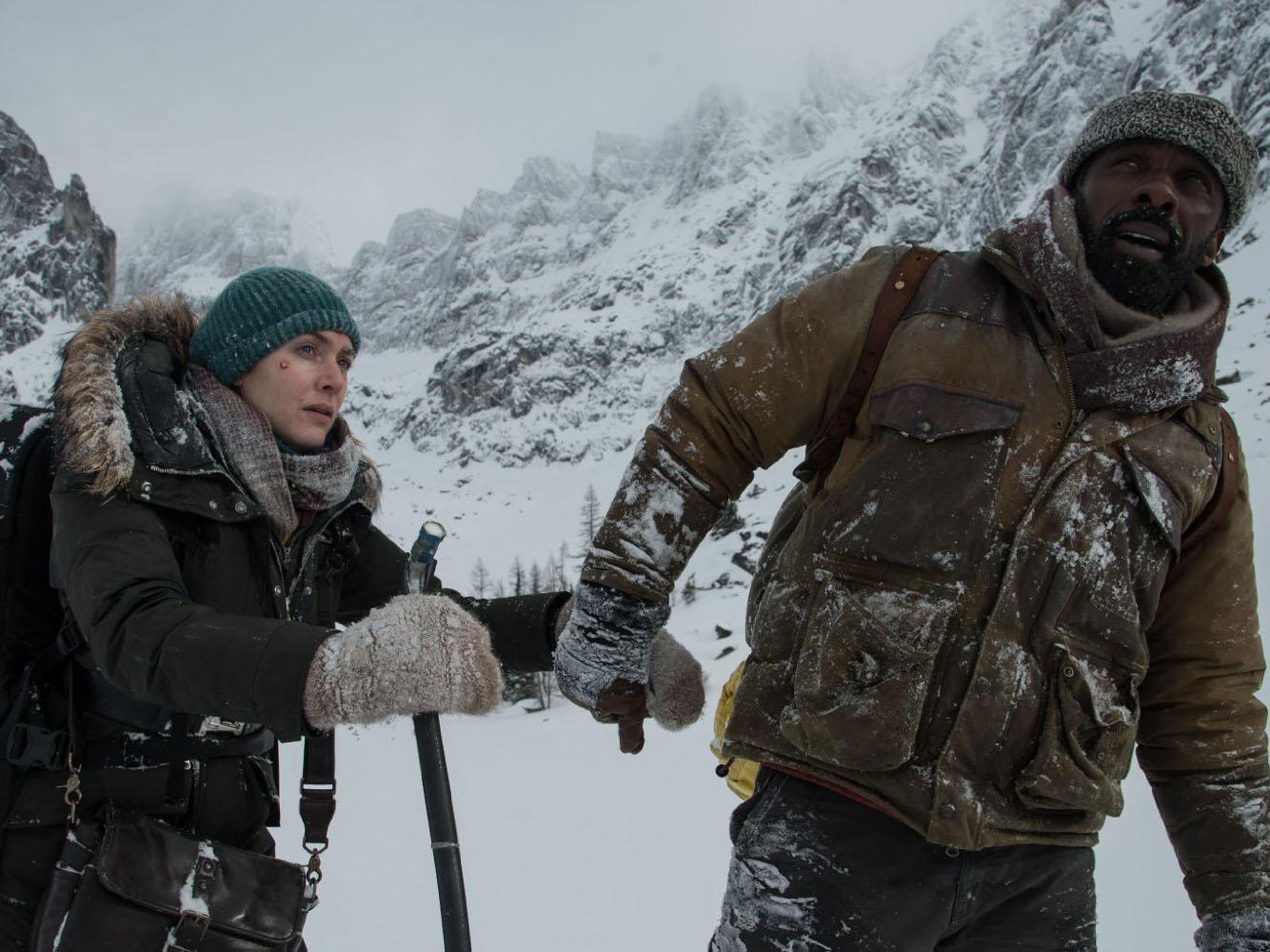 Helping hand: Winslet and Elba in ‘The Mountain Between Us’