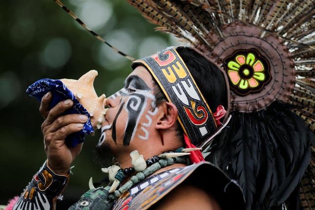 A reveler performs during a "pow-wow" celebrating the Indigenous Peoples' Day Festival in Randalls Island in New York on 8 October 2017