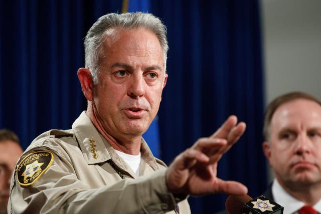 Las Vegas sheriff Joseph Lombardo speaks alongside FBI special agent Aaron Rouse during a press conference about their investigation