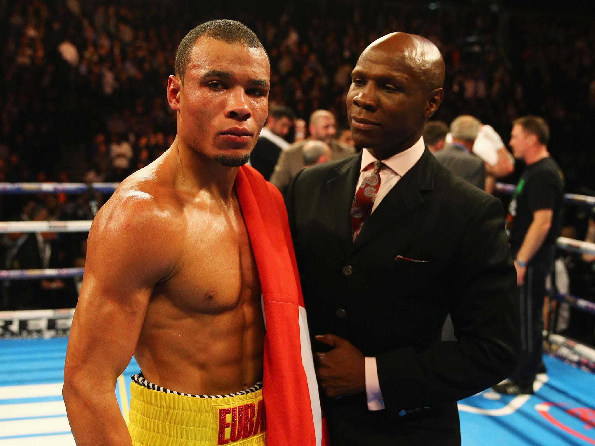 The 28-year-old with father Chris Eubank Jnr after beating Avni Yildirim on Saturday night
