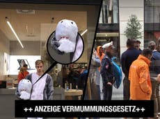 Man dressed as shark given fine under Austria burqa ban