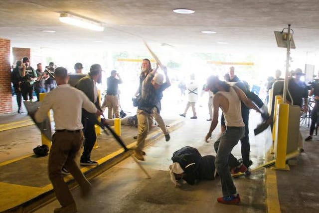 DeAndre Harris was assaulted in a parking garage beside the Charlottesville police station.