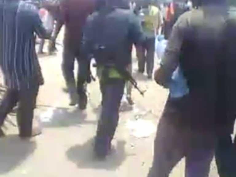 The video shows rebels carrying weapons