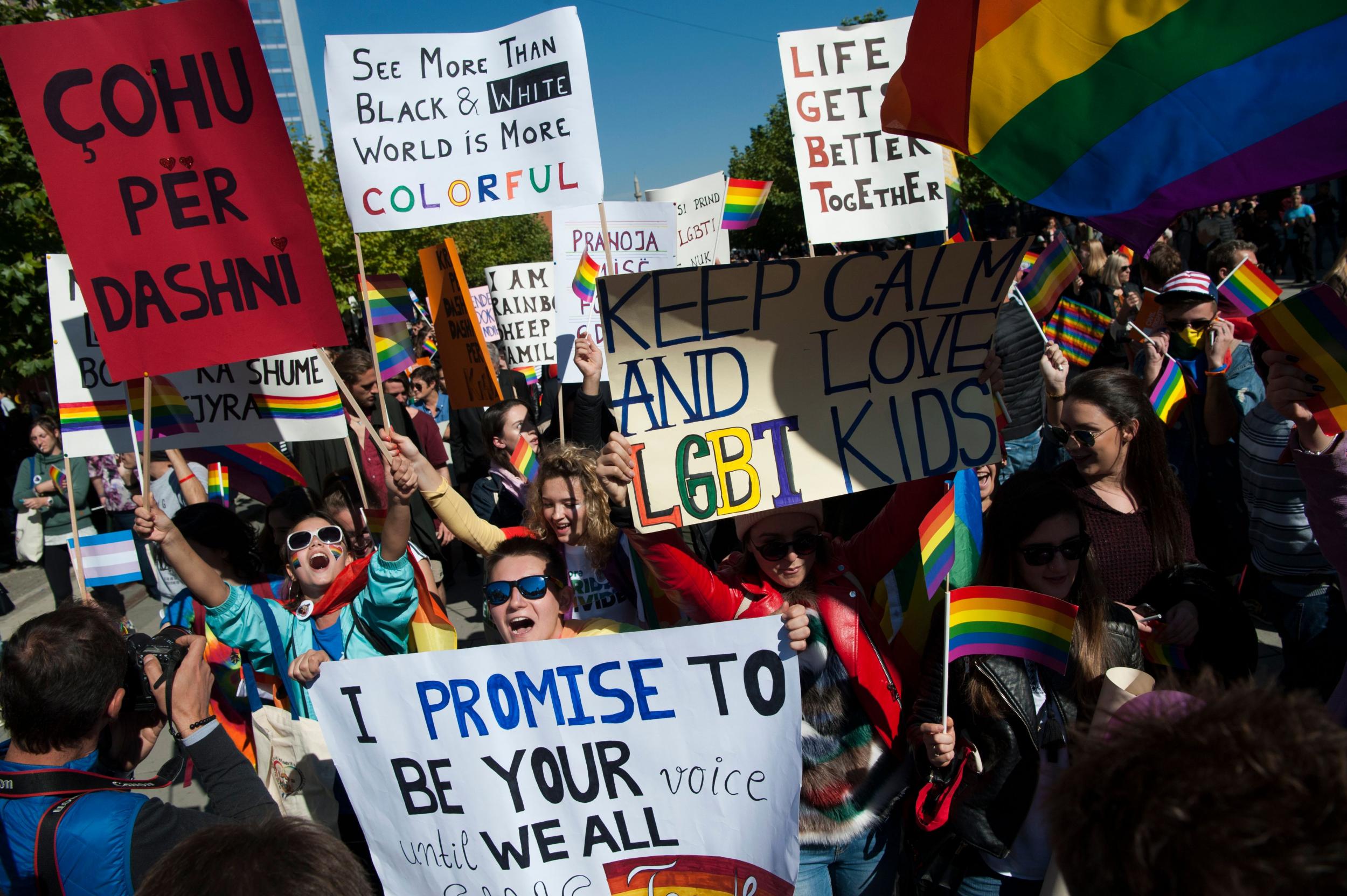 LGBTI rights groups march during the country's first Gay Pride parade in Pristina