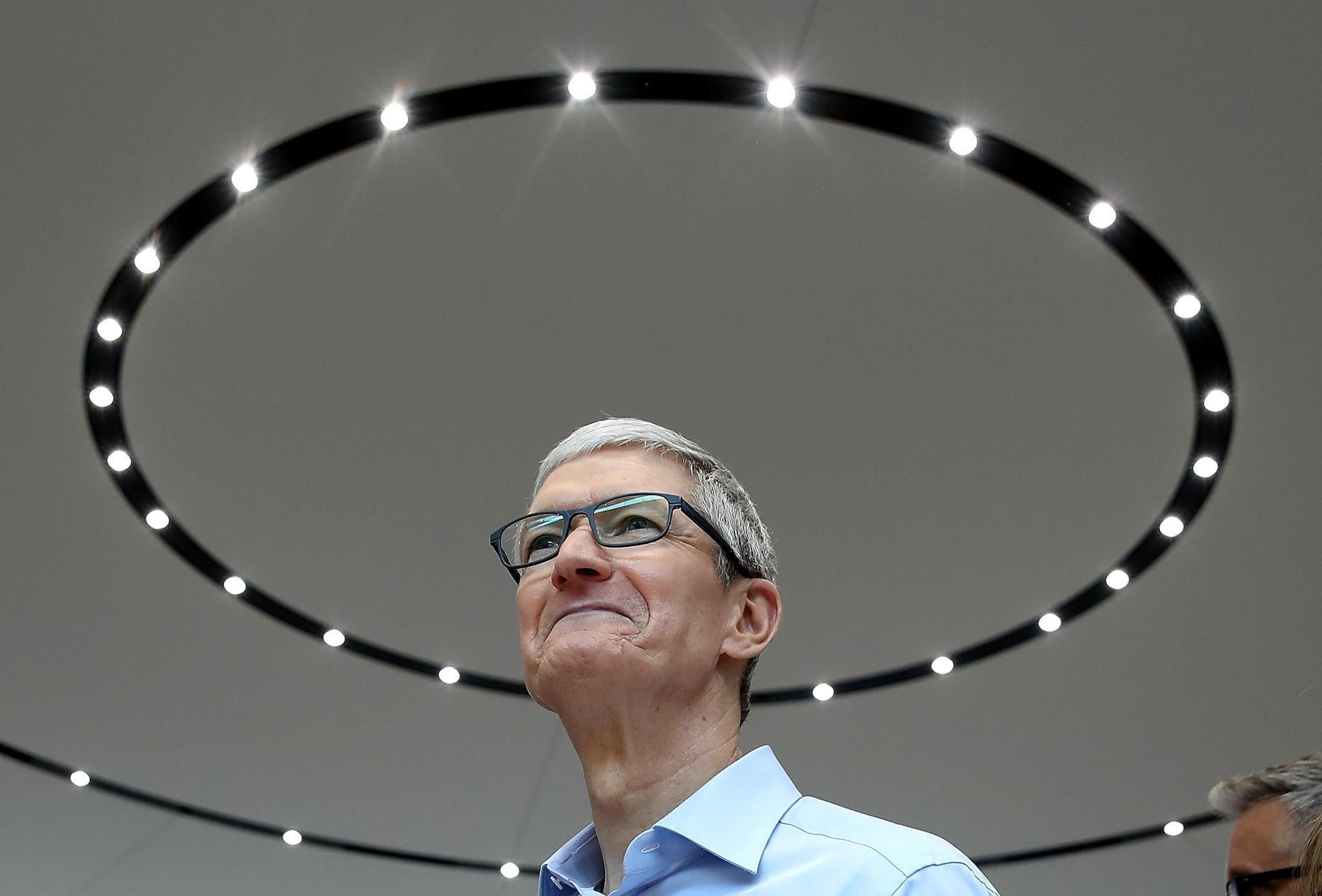 Apple CEO Tim Cook looks on during an Apple special event at the Steve Jobs Theatre on the Apple Park campus on September 12, 2017 in Cupertino, California