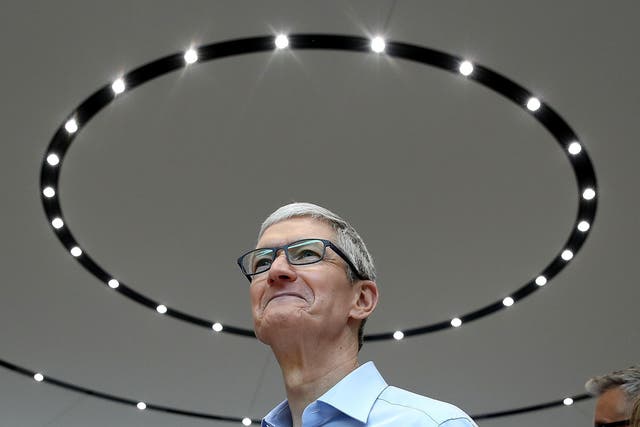 Apple CEO Tim Cook looks on during an Apple special event at the Steve Jobs Theatre on the Apple Park campus on September 12, 2017 in Cupertino, California