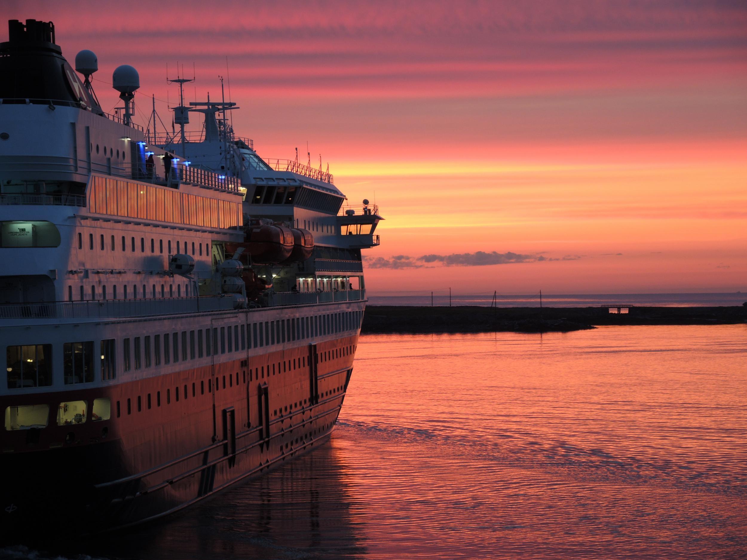 Enjoy the picturesque view from aboard one of the ships in the Hurtigruten fleet