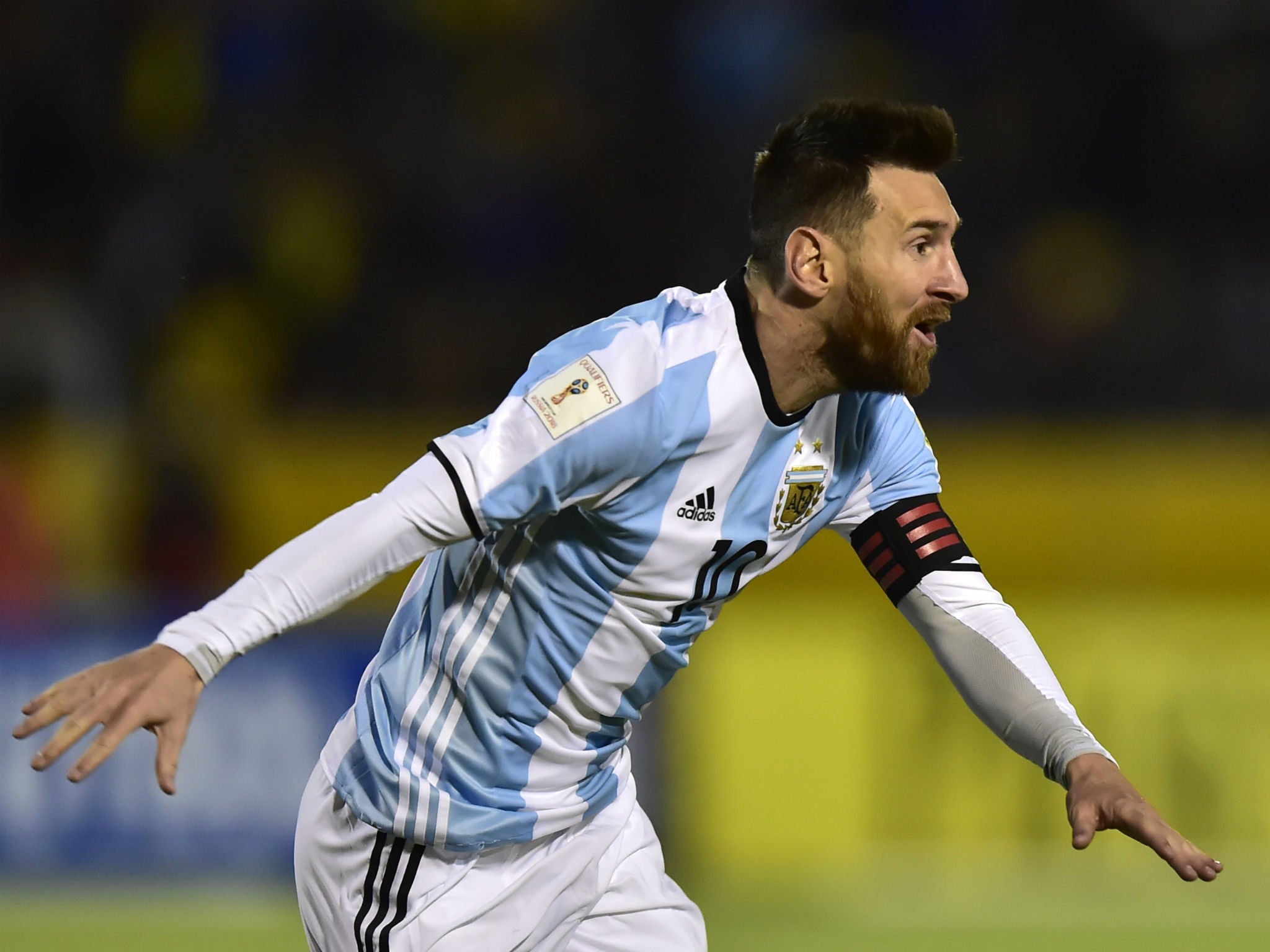 Argentina's Lionel Messi celebrates after scoring his third goal against Ecuador