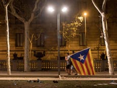 Crowds in Barcelona thinned as Catalan leader 'suspended' declaration