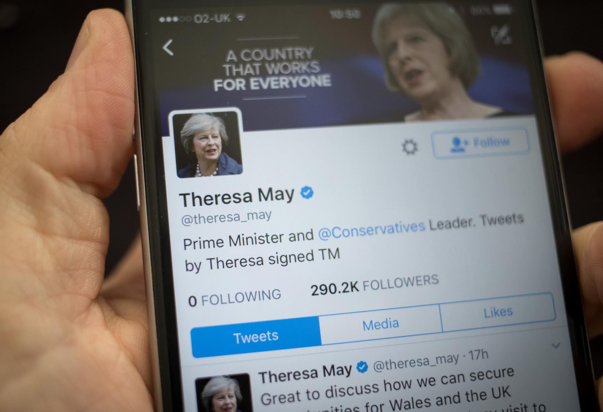 This photo illustration shows the Twitter page for Prime Minister Theresa May on an iPhone on April 26, 2017 in Bristol, England