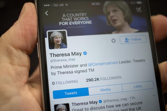 This photo illustration shows the Twitter page for Prime Minister Theresa May on an iPhone on April 26, 2017 in Bristol, England