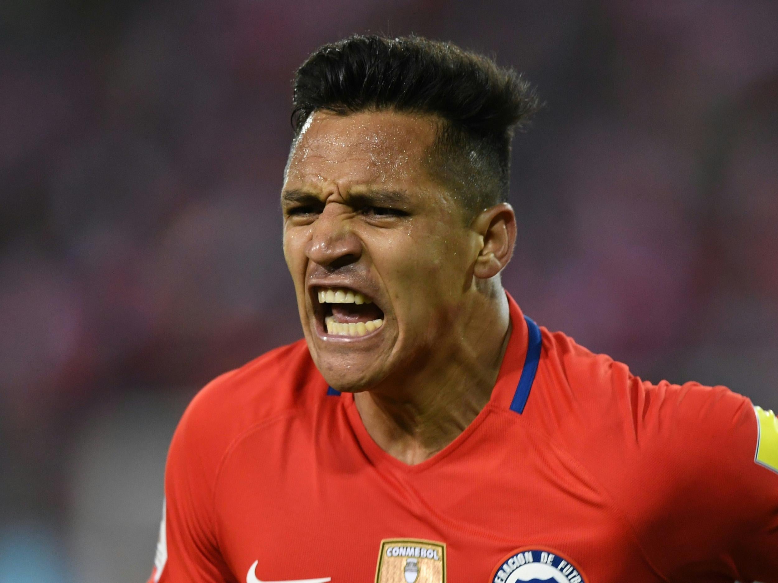 Alexis Sanchez has been away on international duty with Chile