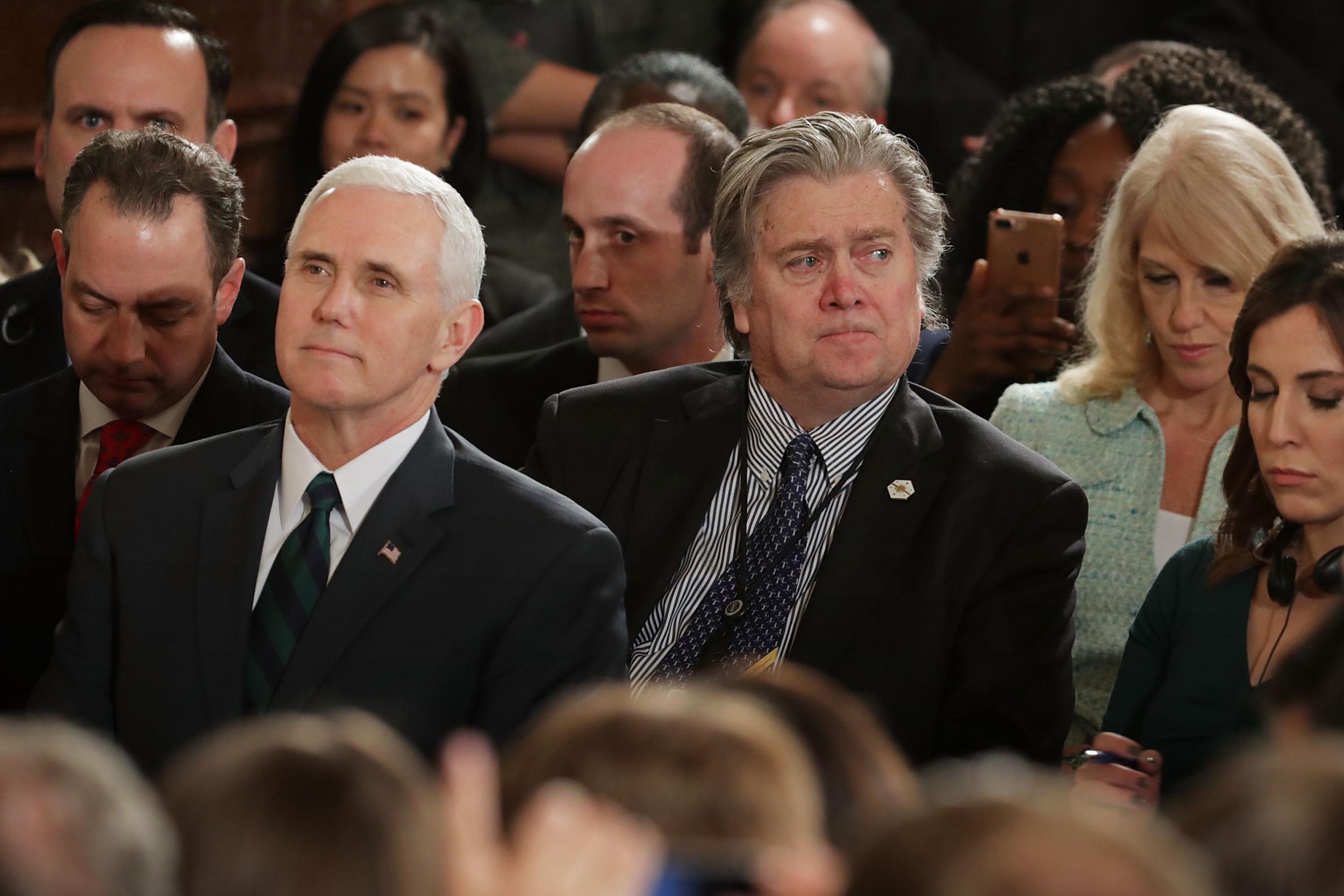 Vice President Mike Pence and former presidential adviser Steve Bannon are seen in the White House ahead of a press conference