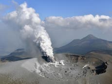 Japanese volcano erupts coating cities in ash