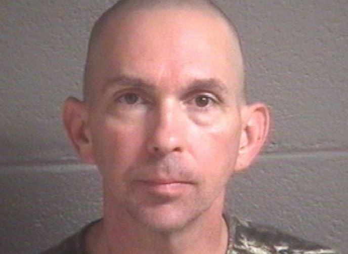 Michael Christopher Estes was arrested after an unexploded device was found at Asheville Regional Airport