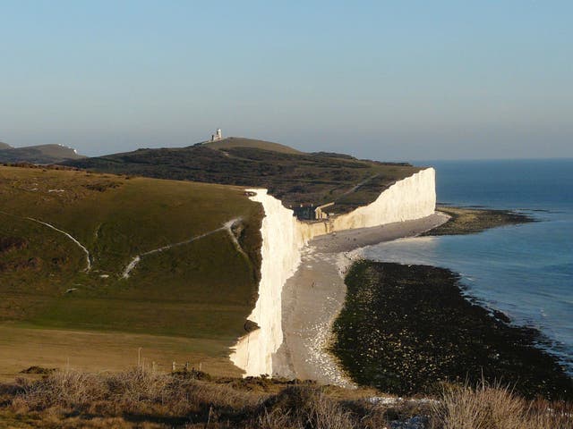 The Seven Sisters cliffs in East Sussex where signs warn visitors of the dangers – in English only