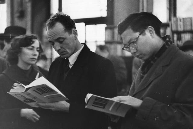 <p>Customers at a London bookshop read ‘Lolita’ on its UK release in 1959  </p>