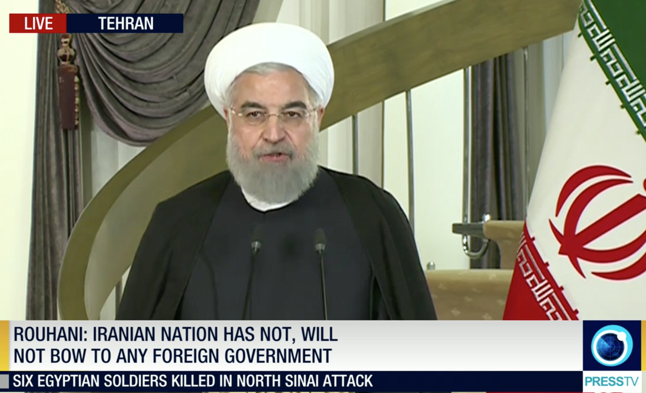 Iran's president said the country will 'never kneel down'