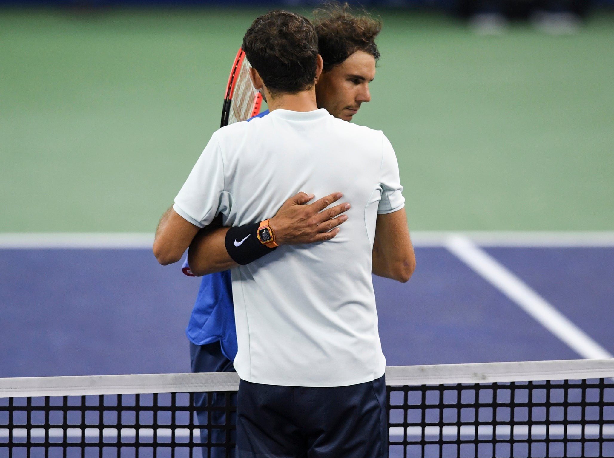 Nadal saw off an inspired Dimitrov