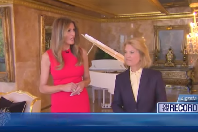 Melania Trump speaks with Fox News - the fake Renoir painting can be seen on the wall in the background