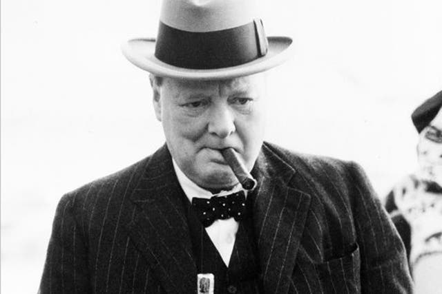 WinstonChurchill smoking a cigar in 1939